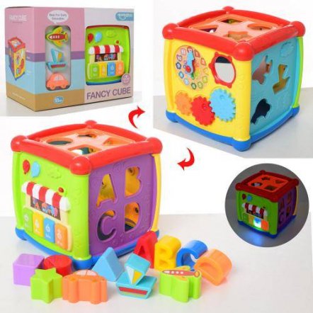 Музыкальная игрушка Куб - сортер с пианино, трещоткой, часами и зеркалом HE0520