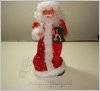 Дед Мороз игрушка с музыкой и светом 2 вида 201-12/60810 в красном